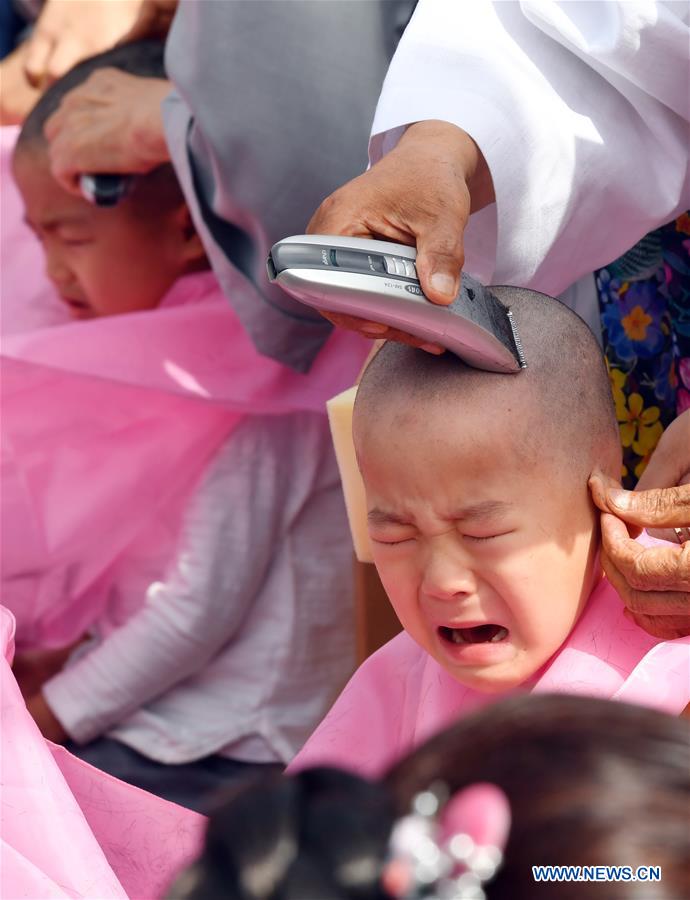 SOUTH KOREA-PUSAN-BOY MONK-HAIRCUT