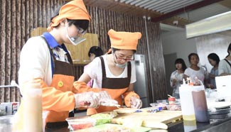 Chinese college student sells milk tea with traditional Chinese Medicine